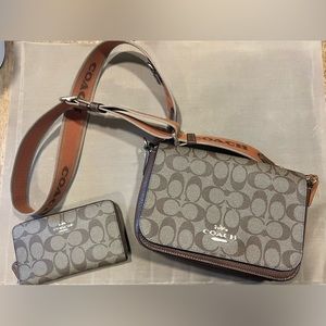 Signature Coach crossbody and matching wallet.